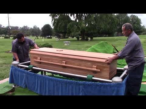 Casket Lowering in a Conventional Cemetery Burial