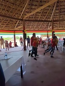 President Dr. Irfaan Ali was given some dance lessons during a community meeting in Nappi Village, Rupununi, Region 9 yesterday. | President Irfaan Ali
