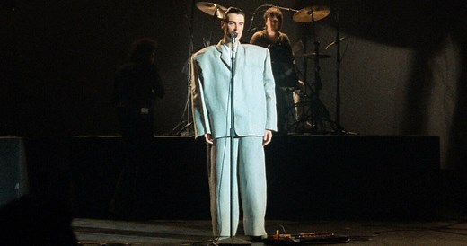 “That will be the inscription on my tombstone - 'Here lies the body of David Byrne. Why the big suit?'” How the Talking Heads' frontman's oversized tailoring defined his most iconic performance