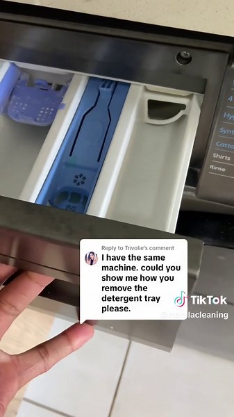 Replying to @Trivolie How to remove the detergent tray from your washing machine.