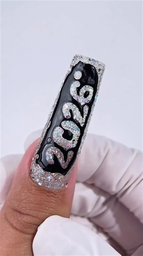 Crisania Neri on Instagram: "2026 New Years Nail Art Tutorial With Poking Gel ✨🪩 Excited to see what’s coming this next year🖤 New goals, new energy, new products and new designs!🪩✨👀 What’s the first goal you’re setting for 2026?👀👇🏼 Using @cris3dshop 🪩Poke Tok Art Gel 🪩Cris Lens 40-120 🪩Professional LED Light Using @ballpit_shop (code 🪩CRIS🪩) 🪩Secret Ingredient 🪩Ball Drop #nails #nailart #newyearnails"