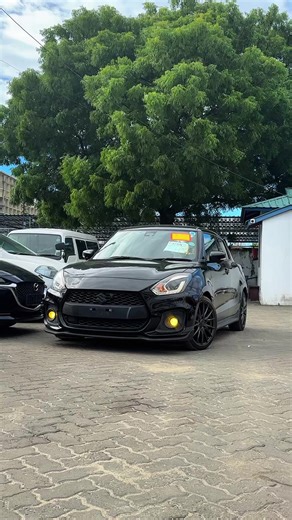 Suzuki swift sport * Engine: 1.4L BoosterJet Turbocharged Inline-4 * Fuel Type: Petrol * Power: 140 hp * Torque: 230 Nm * Transmission: 6-Speed Automatic * 0-100 km/h: ~8.1 seconds * Top Speed: ~210 km/h Exterior: * Colour: Champion Yellow * Sport RS Body Styling * Honeycomb Front Grille * Projector Headlights * LED Daytime Running Lights * Rear Roof Spoiler * Dual Exhaust Outlets * 17