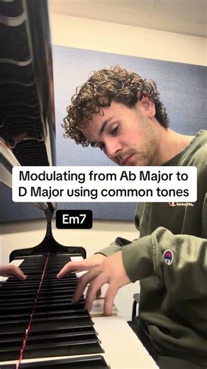 Modulating from Ab Major to D Major using common tones in the melody