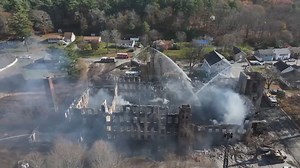 Demolition begins after fire damaged vacant mill in Killingly