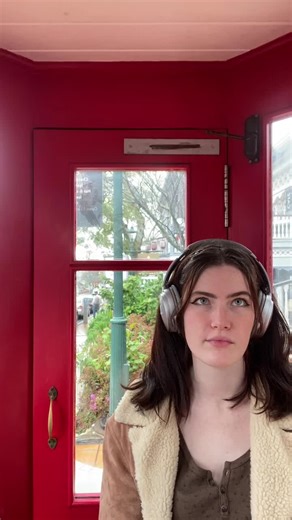 Engaging Conversations in a Vintage Phonebox Elevator