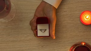 clip-1021905052-man-proposing-marriage-his-girlfriend-during-romantic