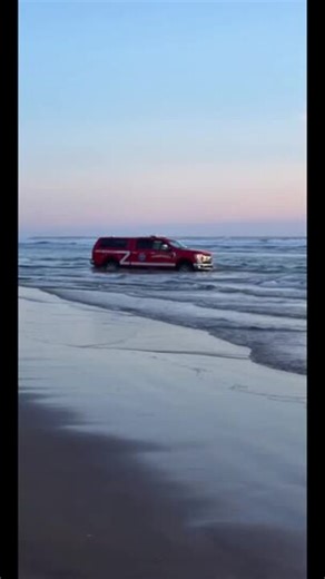 Rescue Truck Needs Rescue After Getting Stuck in Water During Surfer Search