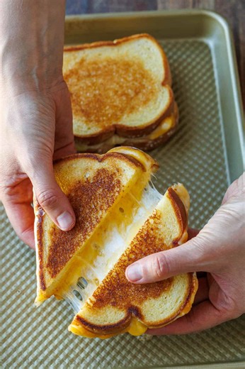 This oven trick changed the way I make sandwiches! Recipe: https://natashaskitchen.com/baked-grilled-cheese/ | NatashasKitchen.com