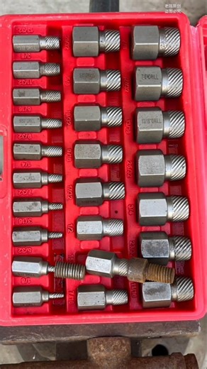 25-piece multi-spline screw extractor set used for removing broken screws, bolts, and studs