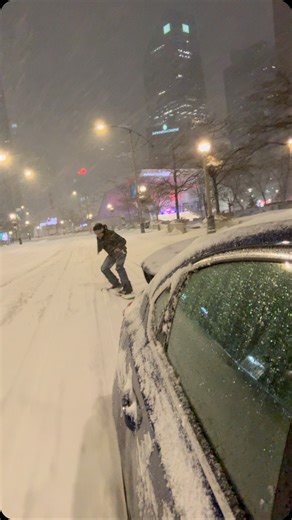 M A X I M on Instagram: "Dealing with a snowstorm in the city is just so much fun. #snowboarding #snowday #snowboard"