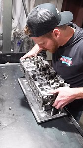 Pressure checking Duramax heads. No bubbles means good head👌#diesellabs #diesellaboratories #dieseltrucks #dieseltechs #dieseltechnicians #duramax #cummins #powertroke #ford #gmc #chevy #ram #enginebuilder #enginebuilding #machineshop | Diesel Laboratories