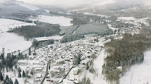 Winter in the Harz national park. Drone aerial footage of the idyllic village Schierke at the bottom of the Brocken Mountain in Germany, Europe.