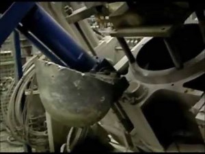 Motoman robot pouring molten metal