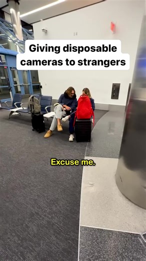 Giving Disposable Cameras to Strangers