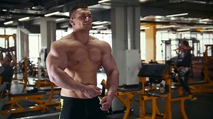 Man Bodybuilder Posing Shows Muscles Near Stock Footage SBV-322389310 - Storyblocks