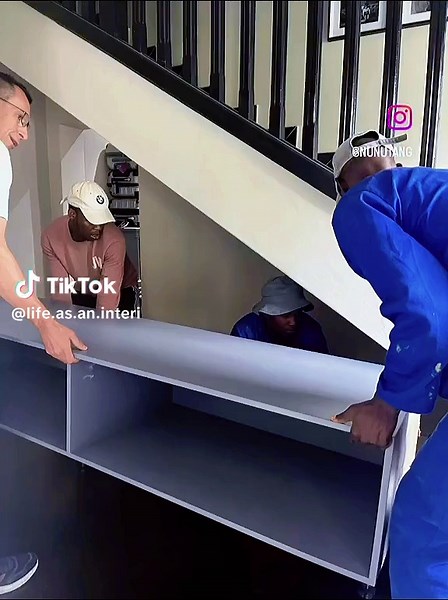We transformed this under-the-stairs nook into a custom mudroom that is both functional and stylish! The gorgeous blue we chose for the unit beautifully complements the black and white accents throughout the space. #davidcarrinteriors #mudroom #interiordesign #homerenovation #interiordesignjohannesburg #furniture #capentry #designerprojects #wood #lifeofaninteriordesigner #furnituredesign @Lynette Nunu Geldenhuys #blue #blackandwhite