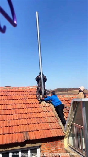 Amazing Transformation: Stainless Steel Chimney on Red Tile Roof
