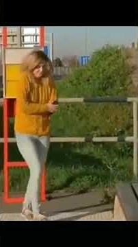 girl has to pee at the bus stop