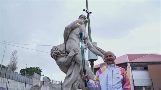 Winter Olympic flame winds its way through southern Italy
