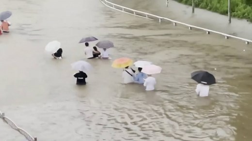 Deadly flooding in China leaves passengers trapped in subway cars