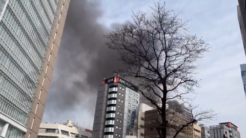 Tokyo fire sends plumes of smoke skyward over apartment blocks