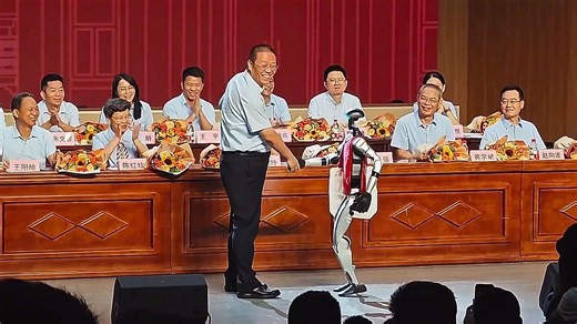 Humanoid robot receives certificate during high school graduation ceremony in China