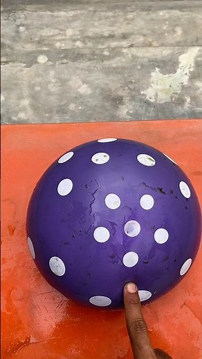 Experiment: Dropping a polka dot water balloon from the top of the stairs, does the balloon explode?