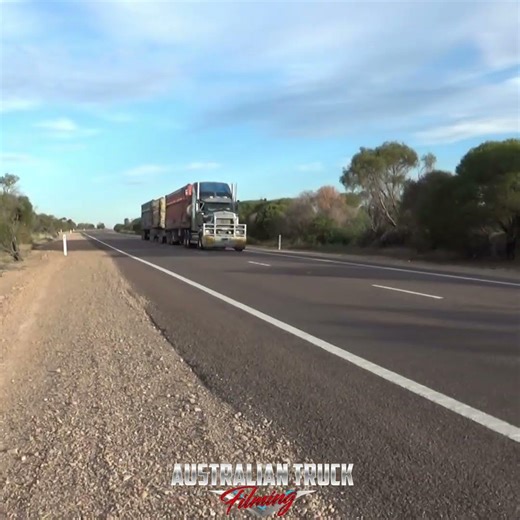 Kenworth T908 AB Triple livestock crate road train flying by!