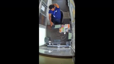 Truck tyre explodes and flies into toll booth covering worker in shattered glass