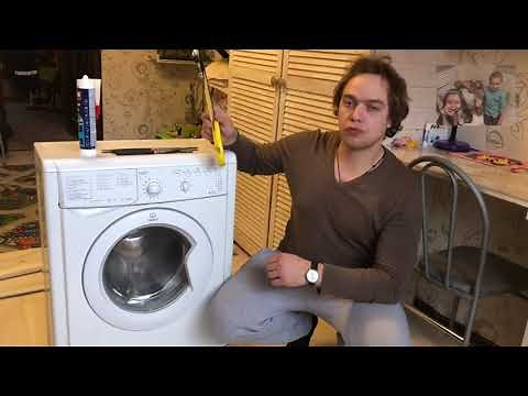 Replacing bearings in an Indesit washing machine with a glued tank.
