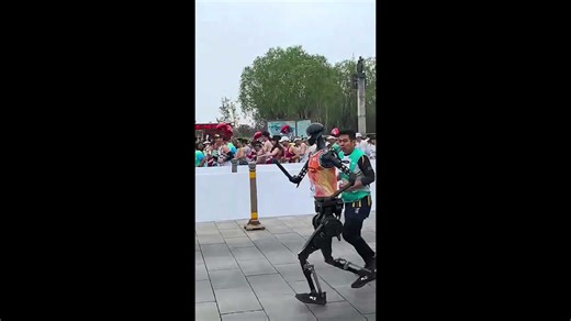 China hosts first-ever humans vs robots half-marathon - watch highlights here