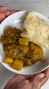 Curry Chicken & Roti for Caribbean American Heritage Month. Indian spices brought to the Caribbean in the 1800s with the island-style twist of heat and herbs make the curry simply incredible. Making roti is a labor of love, but the layers (and the heritage) are worth every fold. #currychicken #roti #curryandroti #caribbeanfood #jamaicanfood #caribbeanamericanheritagemonth #typhaniecooks | TyphanieCooks