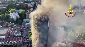 Fire rages through residential building in Milan