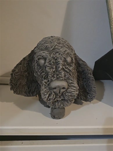 it's been many years since I got my hands dirty and worked with clay. I forgot how satisfying it was to create this mini sculpture. My muse was my beautiful Cockapoo