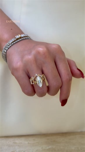 EARTHENA on Instagram: "V-Day sale, 15% off, don’t wait. Featuring The Flora, V-Shaped Floral Diamond Band The Flora, 3ct Marquise-Cut Moissanite Hidden Halo Floral Ring marquise cut engagement ring // floral engagement ring // hidden halo ring // diamond v shaped band // stackable diamond rings // luxury bridal jewelry // Beverly Hills fine jewelry // Earthena Jewelry // Valentine’s Day jewelry sale #earthena #earthenajewelry #engagementring #marquisering #moissanitering"