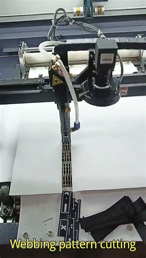 Auto feeding CCD camera laser cutting machine for webbing ribbon woven label pattern.