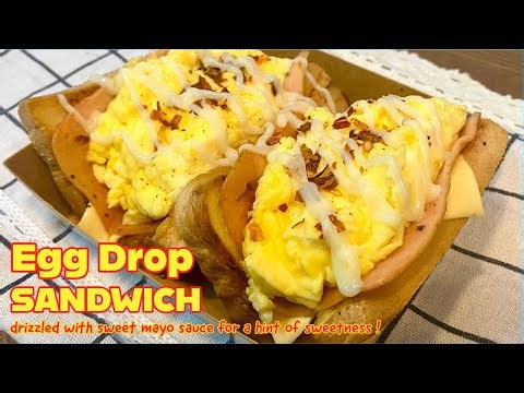Korean scrambled egg sandwich made with soft,fluffy eggs,buttered toast, ham and cheese so delicious