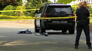 Officer and bystander fatally shot near Boston