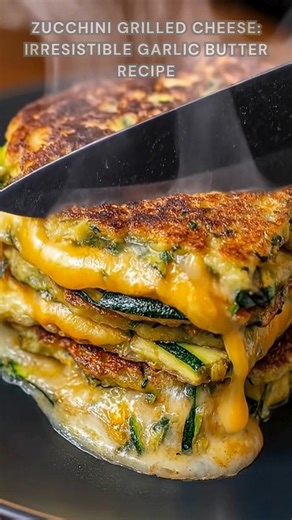 Zucchini grated and squeezed. Sprinkle Parmesan, salt, pepper. Pan-cook in garlic butter 3–4 minutes per side until crispy, melty, and golden with a gooey cheddar center. Ingredients ➤ 2 cups grated zucchini ➤ 1 large egg ➤ 1/2 cup freshly grated Parmesan ➤ 1/4 cup cornstarch FULLL Recipe in First Cօʍʍеոτ 👇👇 | Nessy Recipes