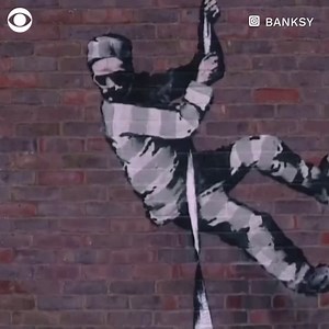 22K views · 299 reactions | In a new video released by Banksy, the street artist claims responsibility for painting the escaping prisoner artwork outside a former prison that once housed Oscar Wilde https://cbsn.ws/2PE0bVl | CBS News | Facebook