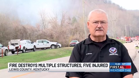 Fire destroys multiple structures; five injured