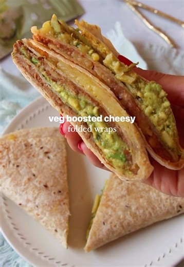 Veg-Boosted Folded Cheesy Wraps - Back To School / Work Lunch Box Series Episode 1 #Ad A familiar cheesy favourite, now with a hidden veg boost! Gooey, cheesy, and secretly packed with veggies (plus freezer-friendly and perfect for lunchboxes)🫶🏼 Ingredients (serves ~4) 4 tortillas or wraps 1 cup mashed beans or refried beans 2 tbsp Nutri V Mixed Veg Powder 1 cup vegan grated cheese 1 avocado mashed with paprika & cumin & a dash of olive oil Method Mix the beans with Nutri V Veg Powder. Mash av