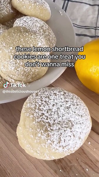 Lemon Shortbread Cookies are an easy 5-ingredient cookie recipe that’s simple to make. Not eggs needed! Mix together one cup room temperature butter, half a cup sugar, 2 tablespoons lemon zest, and a quarter teaspoon salt. Then add in 2 cups of all purpose flour. Chill the dough for at least 30 minutes. When ready to bake preheat your oven to 350° and line a cookie sheet with parchment paper. Roll the dough into balls and bake for 12 minutes. Dust the top of the cooled cookies with powdered suga