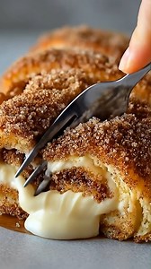 🍥 Cinnamon Sugar Cream Cheese Roll | Warm, gooey, and impossible to resist 🤍 This cinnamon sugar cream cheese roll is pure comfort baking — soft, golden bread rolled up with buttery cinnamon sugar and a creamy, melty center that oozes with every slice. It’s the kind of dessert that fills the kitchen with the coziest smell and pulls everyone right to the counter. Each bite is sweet, warm, and indulgent, with that perfect contrast between fluffy dough, spiced cinnamon layers, and rich cream chee