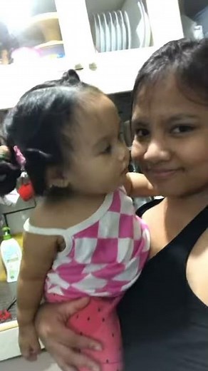 Baby loves kissing mommy