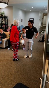 Tyler from Concho Hearts Hospice Pilot Point/Denton Co, Sherman, Garland, & Decatur having fun dancing with Bonnie from Eagle Ridge Alzheimer's Special Care Center! ❤️ | Andy Goin
