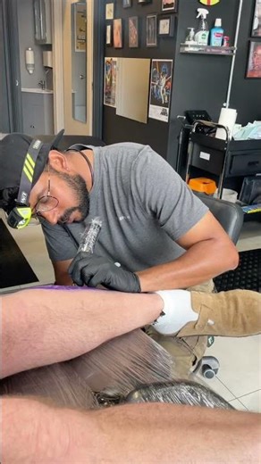 Biomechanical Calf Tattoo with Marathon and UK Flag | Teddington Ink