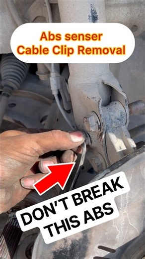 don't break the ABS sensor wiring Shock Nut Removal Don’t Break the ABS Sensor Cable Clip! #