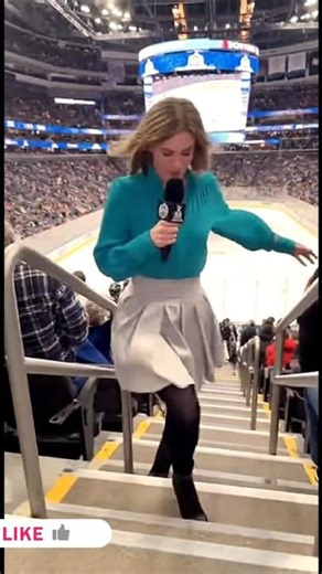 Unexpected Tumble at the Hockey Game, Unfazed Reporter #Shorts #Viral