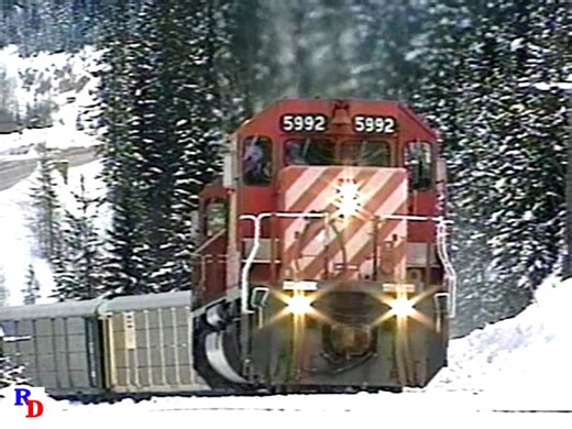 Canadain Pacific SD40-2s are roaring up the Kicking Horse Pass grade at Yoho. This is the best of winter railroading and mountain railroading! From the Highball Productions show "Winter on Kicking Horse Pass" https://rfd.video/KHP | Railfan Depot